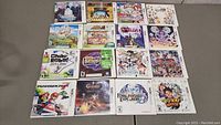 Grid of 16 Nintendo 3DS game cases laid out in 4×4