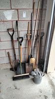 Group shot of all tools leaning against block wall