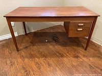 Full front view of desk showing overall design and structure