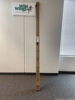 Boxed Savage Widestone Seamless Blackout Paper Roll standing upright against wall.