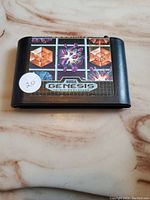 Front view of Sega Genesis Columns game cartridge showing artwork and Sega Genesis logo on the label.