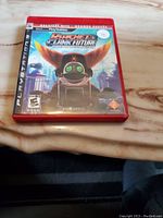 Front cover of Ratchet & Clank Future PS3 game case showing title and artwork.