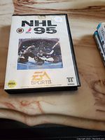 Front of Sega NHL 95 game case showing cover art and branding.