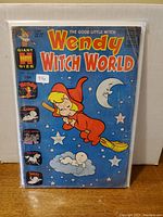 Front cover of Wendy Witch World comic book issue 10, showing character Wendy flying on broomstick under a starry night sky with moon and clouds.