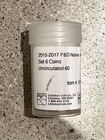 Plastic tube containing six uncirculated Native American $1 coins from 2015-2017 with P&D mint marks, label from Littleton Coin Co.