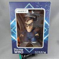 Front of boxed 10th Doctor Who Titans vinyl figure, visibly sealed in packaging.