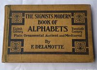 Front cover of The Signists Modern Book of Alphabets showing author F. Delamotte and range of fonts covered from the eighth to the twentieth century.