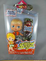 Front view of Bratz Baby Boy doll Cameron in original packaging with figure and branded graphics.