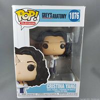 Front view of boxed Funko Pop! vinyl figure of Cristina Yang from Grey's Anatomy, figure #1076.