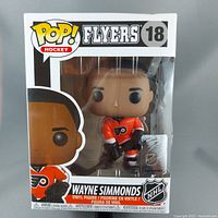 Front view of Wayne Simmonds Flyers Funko Pop! Hockey vinyl figure #18 in original packaging, showing full figure and box details.