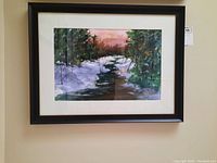 Full front view of framed watercolor painting against wall