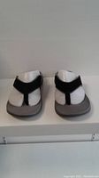 Front view of Dr Comfort men's sandals showing black straps and gray footbed