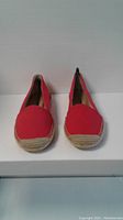 Front view of pair of red Franco Sarto women's espadrille shoes size 9 showing canvas upper and espadrille sole.