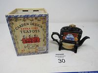 Teapot with original box showing the Cardew Design branding and 'Extra Fine Teapots' text.