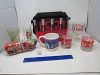 Full lot with glasses, ceramic mug, bottle carrier and toy truck