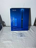 Front image of the blue box packaging for the Fairwill Sonic Electric Toothbrush model 507 A, showing toothbrush image and brand logo.