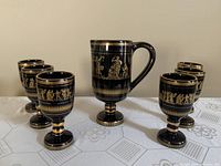 Full set of one pitcher and six goblets arranged on table