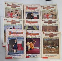 Nine Baby-Sitters Club Super Special books arranged in a group, showing front covers for identification.