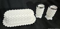 Overall set of milk glass hobnail butter dish and matching salt and pepper shakers