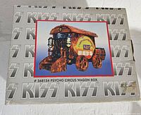 Photo of the original box showing front with KISS logo background and photo of the wagon collectible