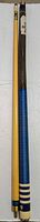 Full length photo of the two-piece wooden pool cue with natural wood shaft and blue wrapped handle with decorative stripes.