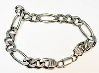 Full view of men's silver chainlink bracelet laid flat showing alternating large oval and curb links and lobster clasp.