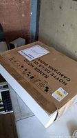 Boxed IKEA GENOMDRIVA range hood with original packaging showing product name and instructions label.