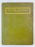 Front cover view showing green cloth hardcover with gold embossed title and author.