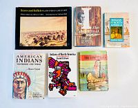 Overview photo showing six books on Native American history and culture, various sizes and condition lightly used.