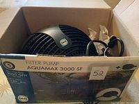 Front of original box showing model name and warranty