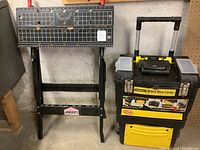 Stanley Mobile Work Center and Jobmate portable work bench placed side by side, showing overall condition and details