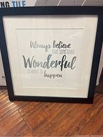 Black square 18x18 frame with a white mat and inspirational quote print inside.