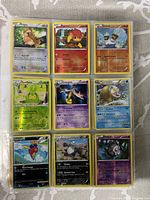Page showing nine cards including Pidgey, Chimchar, Bronzor, Swadloon, Gourgeist, Mamoswine, Carvanha, Timburr, Duskull