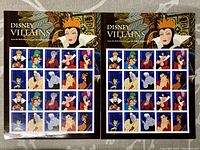 Two full sheets of Disney Villains Forever stamps side by side showing all characters.