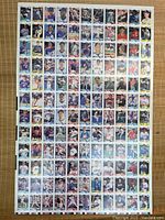 Full view of a sheet with 108 Fleer 1990 baseball cards arranged in 9 columns and 12 rows on white card stock.