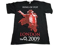 Black Michael Jackson band T-shirt laid flat, front view showing full graphic with 'KING OF POP LONDON The O2 2009'.