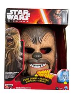 Front view of the new in box Star Wars Chewbacca electronic mask packaging with visible artwork and product details.