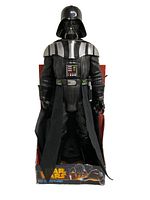Full view of the Star Wars Giant Size Darth Vader figure in original box, showing figure standing and packaging.