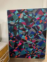 Full view of the acrylic painting showing the complete abstract geometric pattern with various colors and shapes.