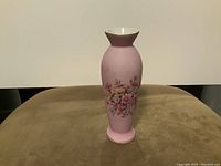 Front view of the pink and white vintage Ayame Seizan vase showing floral design and overall shape.