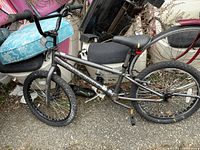 Side view of Diamondback BMX bike showing frame, tires, seat, and handlebars.