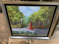 Full view of the oil painting showing the lady in red dress walking in a garden with umbrella and detailed fence and foliage