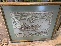 Full view of framed vintage map depicting Mantova with cityscape and water bodies.