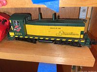 Green and yellow ‘Route of the Streamliners’ locomotive #1101