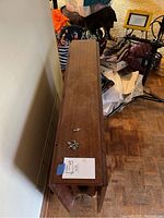 Table in closed position; hardware on top