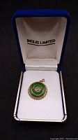 Pendant in open blue Inglis Limited jewelry box, full view