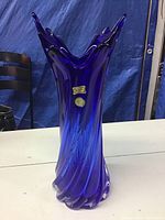 Blue Egermann Art Bohemian crystal vase with swirling and twisting detail and jagged rim