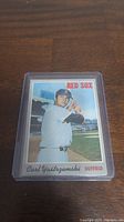 Front side of the card featuring Carl Yastrzemski in batting stance with Boston Red Sox uniform and team name visible.