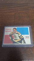 Front of the 1960-61 Topps Bronco Horvath hockey card showing player portrait and team info.