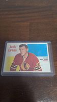 Front side of 1960-61 Topps Jack Evans hockey card showing player portrait and basic details.